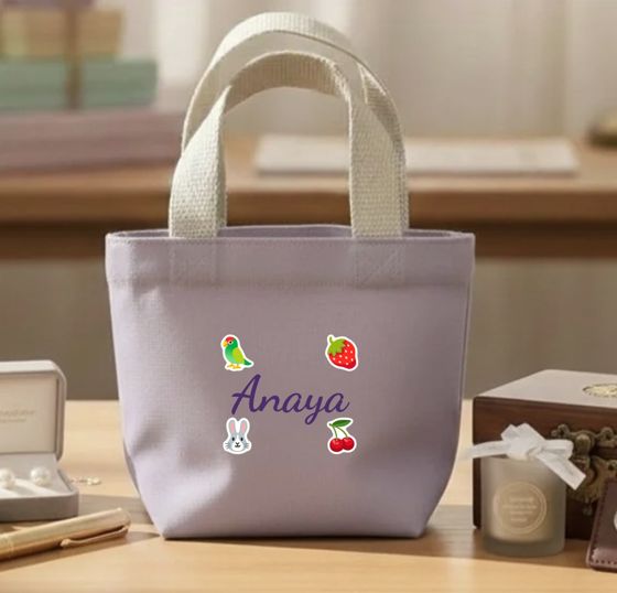 Lavender mini bag with a name and stickers