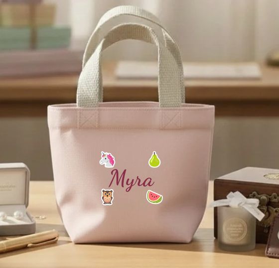 Pink mini bag with a name and stickers